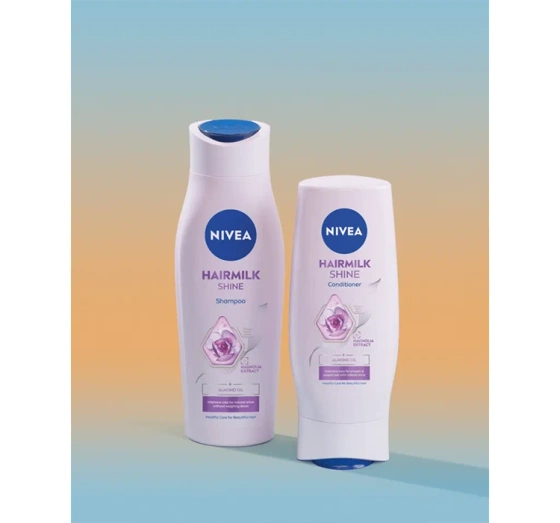 Kliknij na zdjęcie, aby je powiększyć NIVEA Hairmilk Shine Haarshampoo für natürlichen Glanz 400 ml