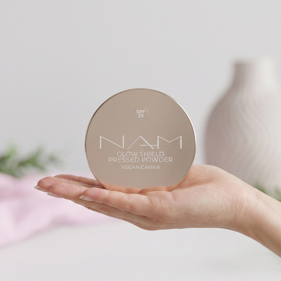 NAM Glow Shield gepresster schützender Puder SPF 25 10 g