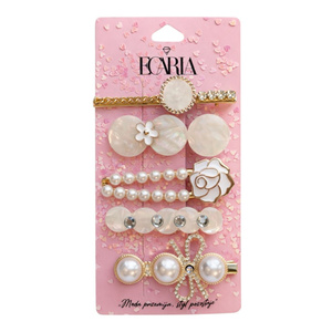 eCarla Set mit perlfarbenen Haarspangen SP457, 5 Stück